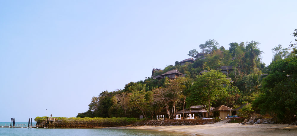 The pier of Six Senses Koh Yao Noi and the private villas on the hill