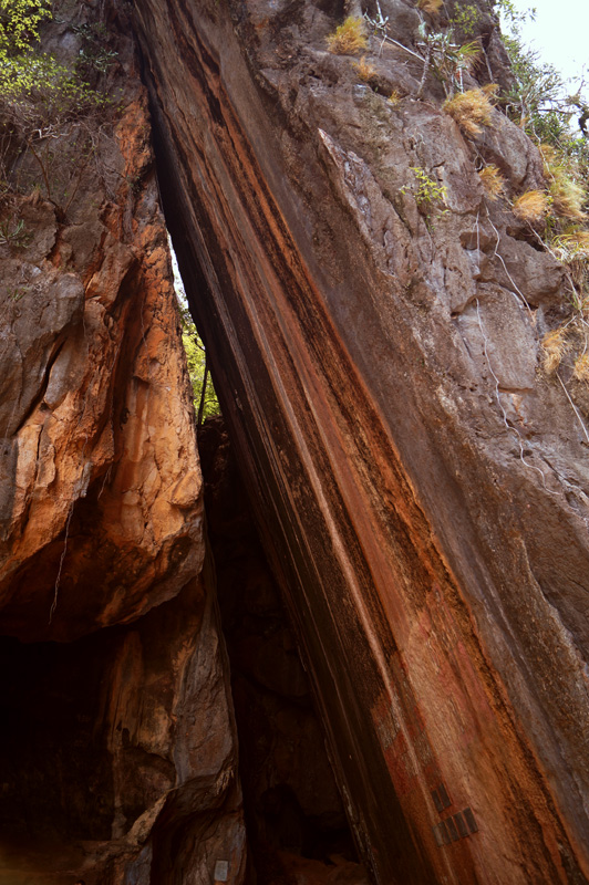 Vertical rock slide on James Bond Island forming a cave