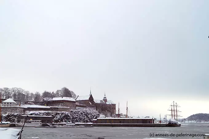 akershus fortress looming over the Harbor of Oslo