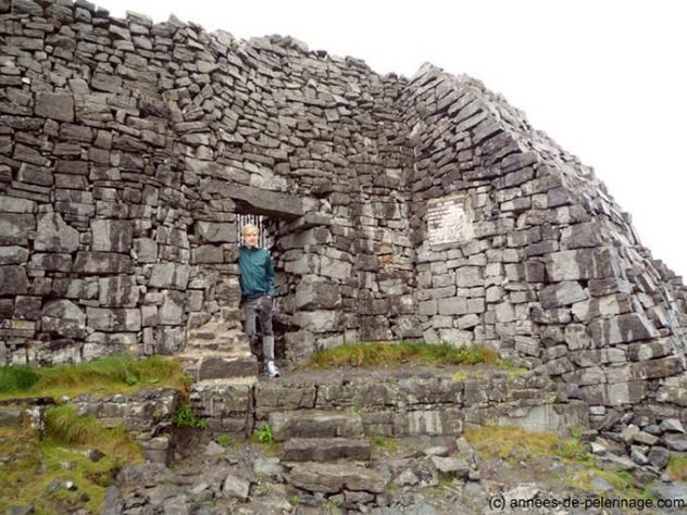 Me entering the prehistoric stone rings of Dún Aonghasa through a small gate