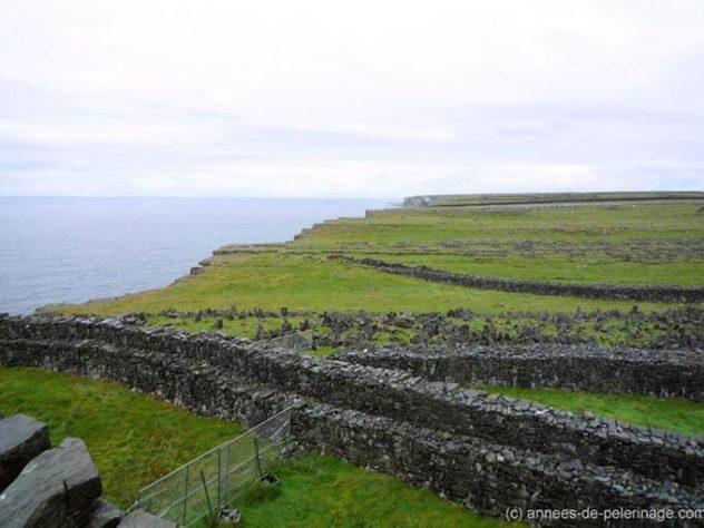 stone rings and metall barriers at Dún Aonghasa on Aran Islands, Ireland