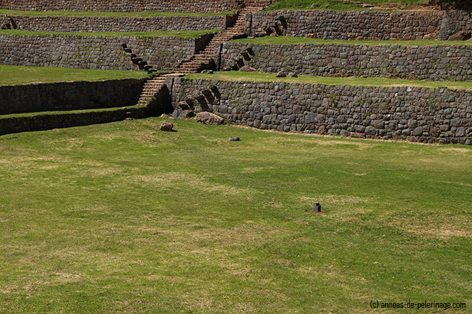A ritual marking stone in the middle of the biggest inca terrace in tipon