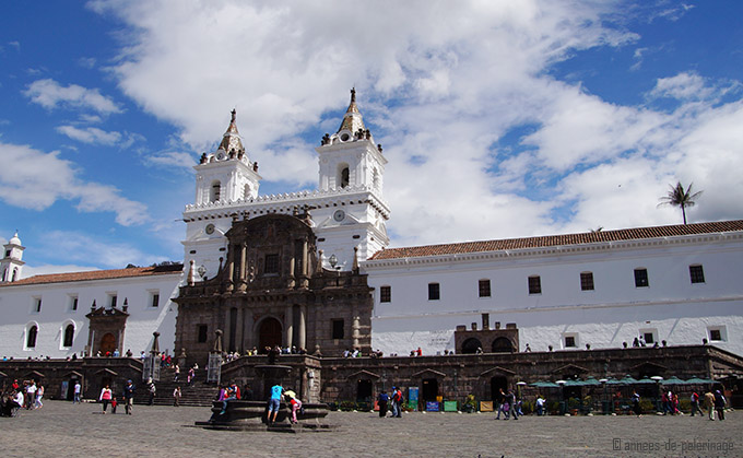 a monastery and a sunny square in quito ecuador