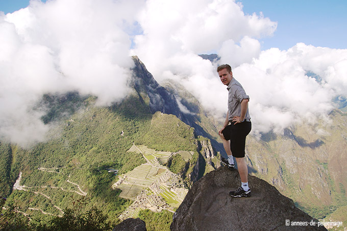 Standing on the peak of wayna picchu and enjoying the view on Machu Picchu