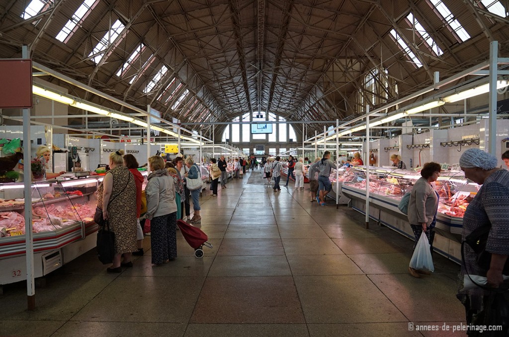 The central market in riga and locals shopping groceries