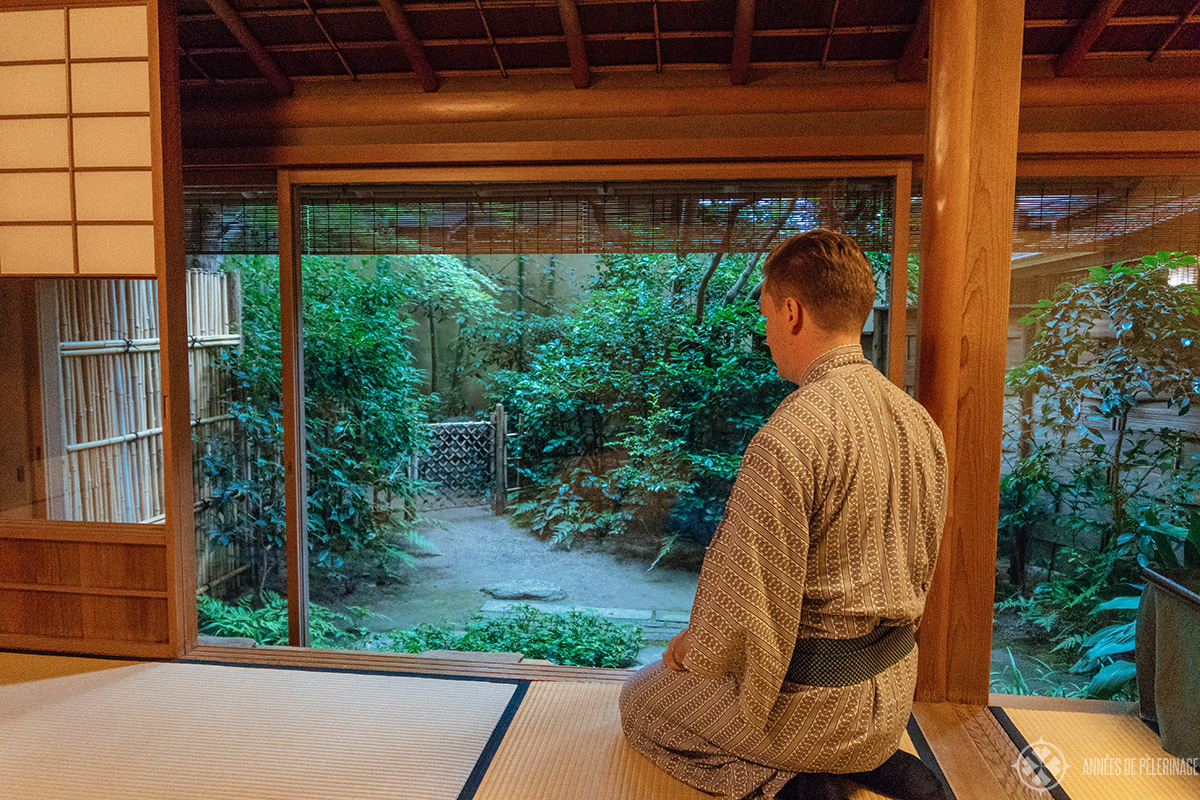 Me, wearing a yukata in a Ryokan in Kyoto - if you are wondering what to wear in Japan, then you really don't need to worry. Yukatas are provided for free in most hotels