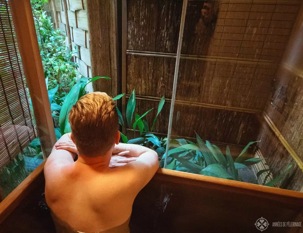 Enjoying the view of the zen garden from the bathtub of the tawaraya ryokan in Kyoto, Japan