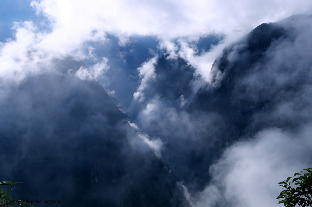 The fog around Machu Picchu rising