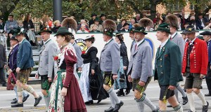 bavarian men and women in their traditional costumes for oktoberfest parade in munich