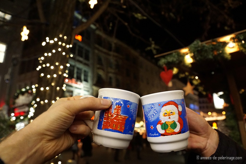 Drinking gluehwein (mulled wine) on the Christmas market in Munich