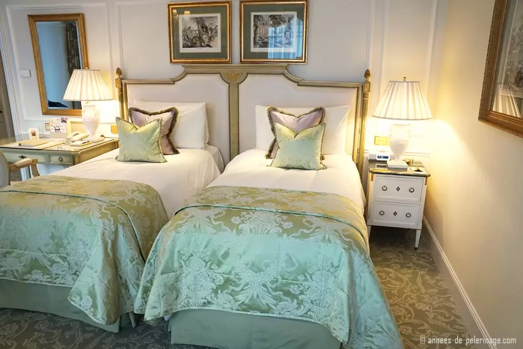 A premium room with two beds at the Four Seasons Hotel George V in Paris