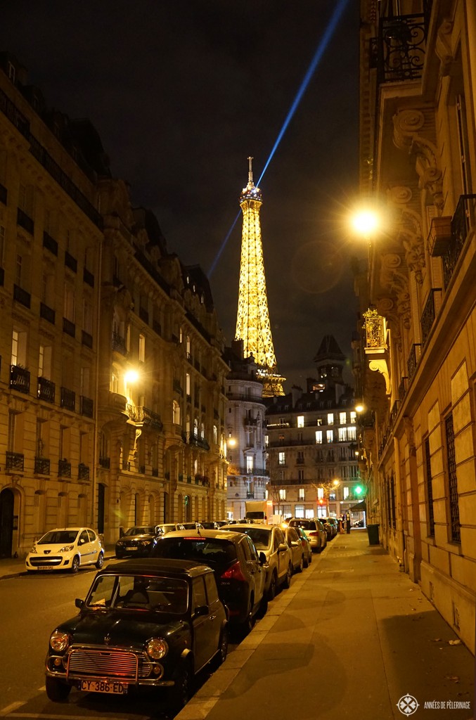 Paris at night - a wonderful street scene with the Eifel Tower in the background