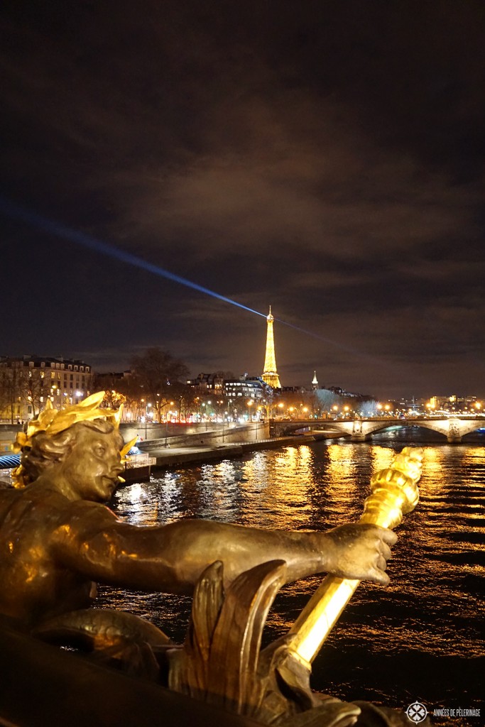 Pont Alexandre III at night with the Eifel Tower in the background
