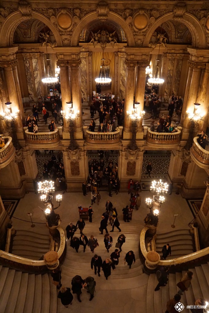 The fabulous staircase of the Opéra Garnier in Paris. Put viewing a performance on your list of things to do in Paris to see it with a black tie crowd