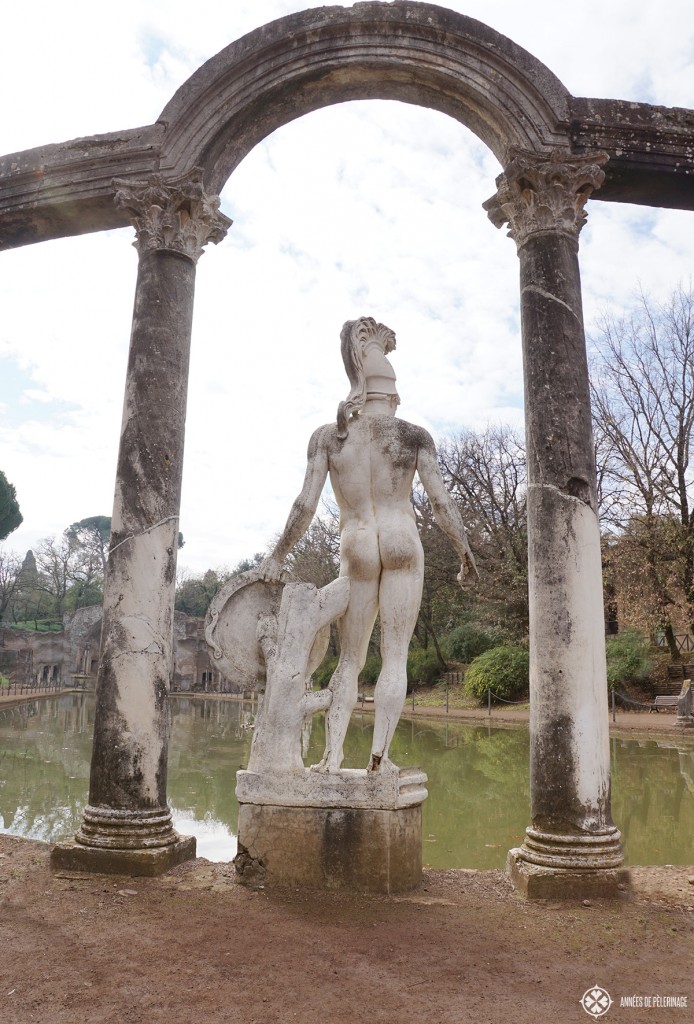 A greek statue on the banks of the Canopus pool of the Villa Adriana in Tivoli