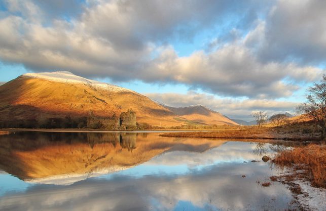 Kilchurn Castle in the early morning light near Oban, Scotland by john mcsporran