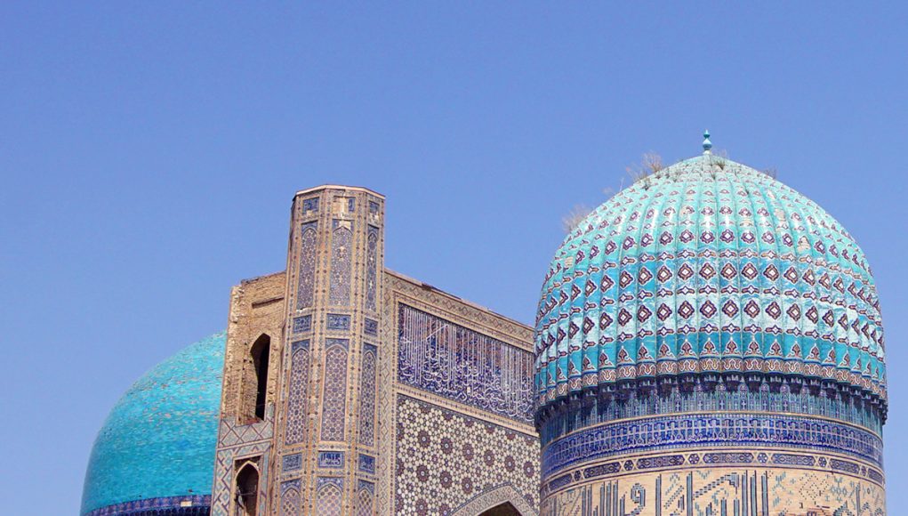 blue tiled domes of the Bibi-Khanym Mosque in Samarkand, Uzbekistan