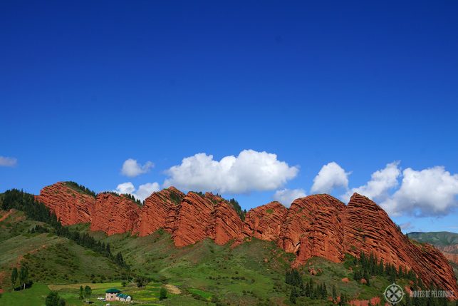 The Seven Bull rock in Jeti-Oguz Kyrgyzstan. Red clay has been weathered down forming these impressive rock formations