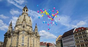 The Frauenkirche in Dresden in bright daylight with ballons