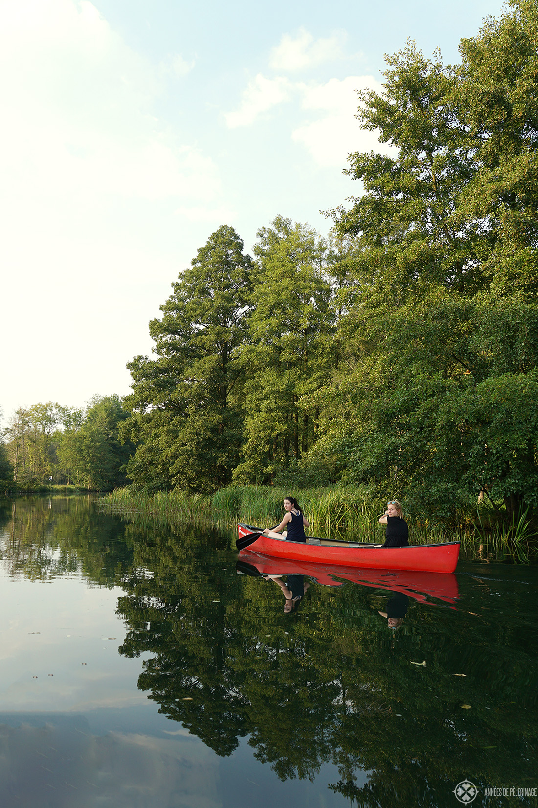 Two girls on a canoe tour through the Spreewald near Lübbenau in Germany