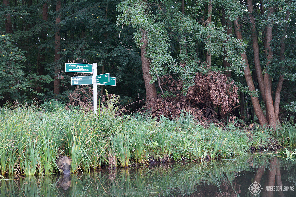 Way signs along the water channels of the Spreewald forest in Germany