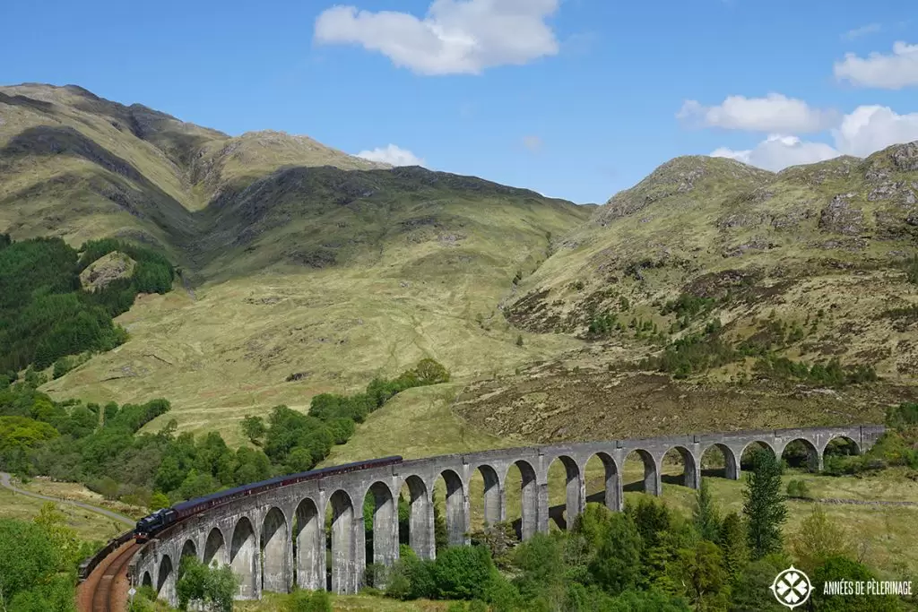 The glenfinnan viaduct and the jacobite steam train in Scotland