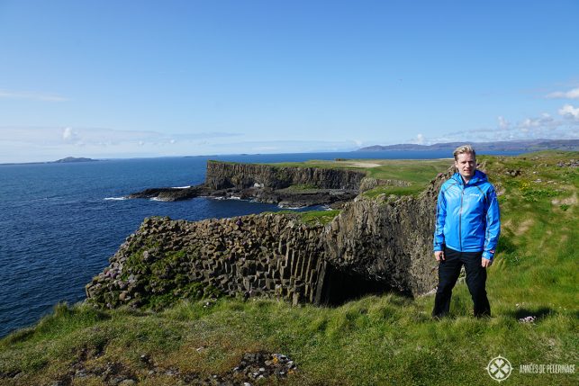 Me wearing a rain jacket in Scotland - one of the items you should definitely not forget to pack for Scotland