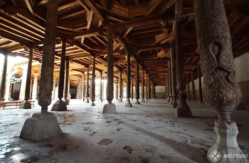 the many carved pillars inside the Juma Mosque in Khiva, Uzbekistan