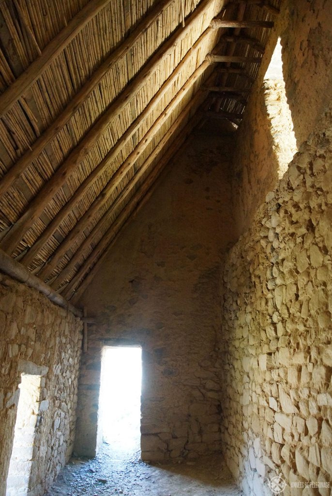 Inside an ancient granary in Ollantaytambo, Peru