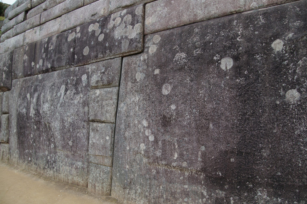 Perfect walls in Machu Picchu - big stones having multiple edges so typical of the Machu Picchu architecture