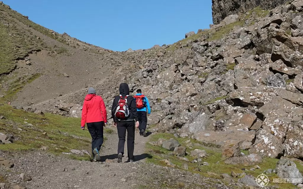 a group of hikers in Ireland with rain coats and small backpacks