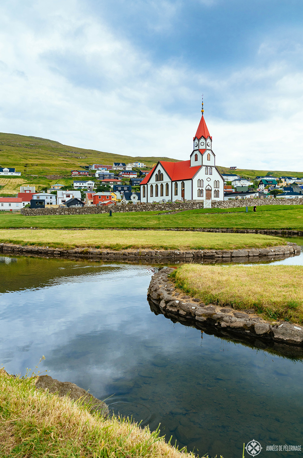 A colorful traditional wooden church in a smalltown in Iceland