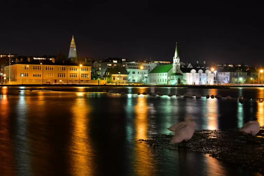 Reykjavik Tjornin lake at night