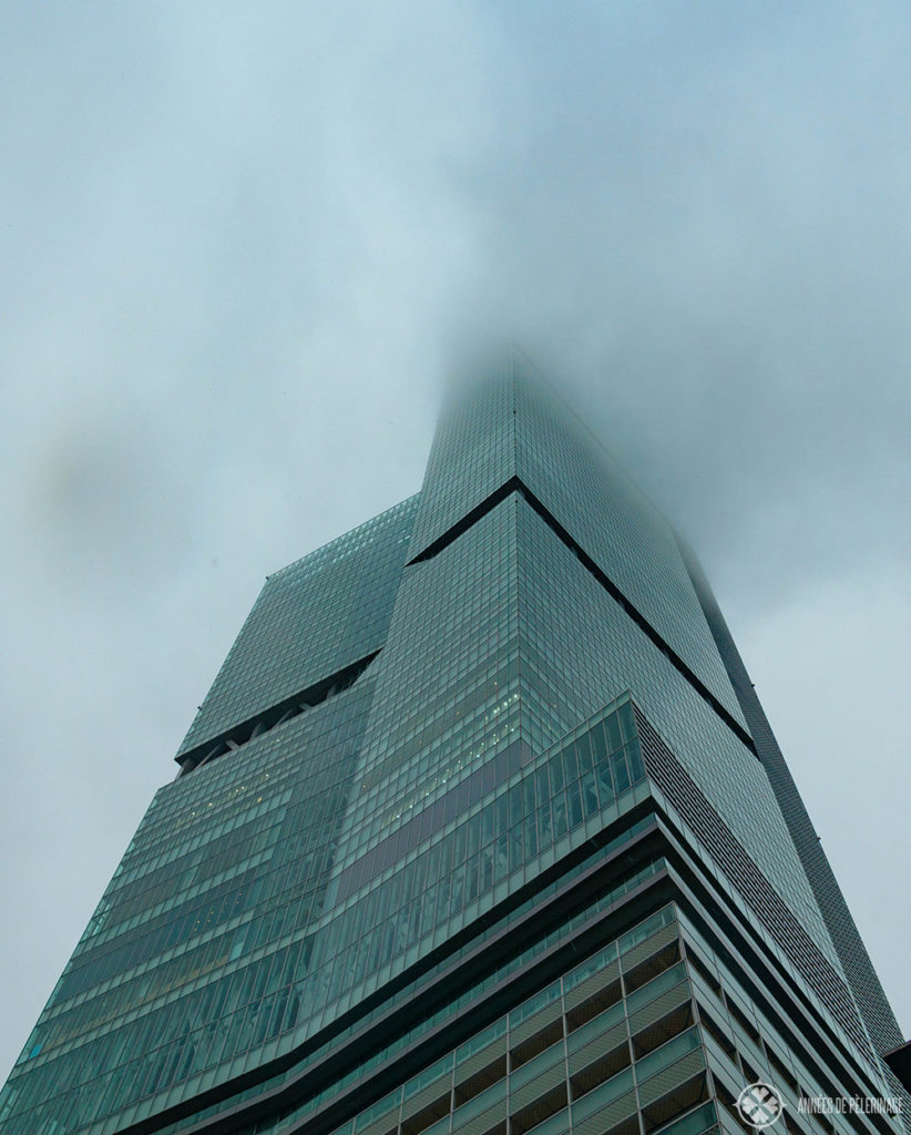 The abeno harukas tower with clouds obscuring the very top - the higghest building in Osaka
