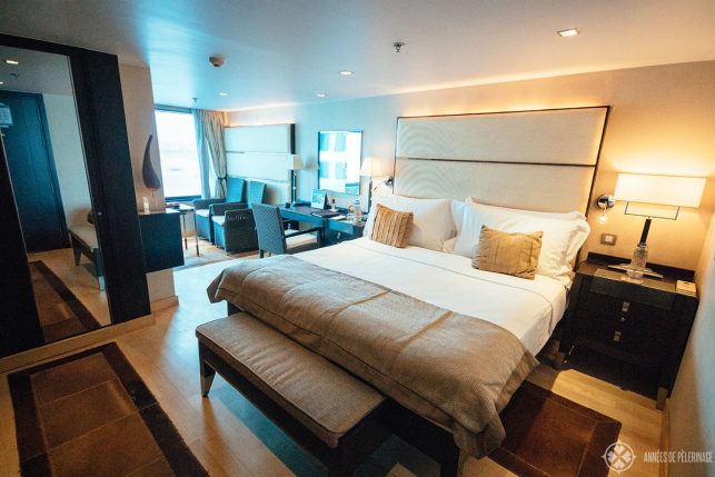 A standard luxury cabin onboard the Oberoi Zahara luxury Nile cruise ship in Egypt with a full king size bed. When it comes to this Oberoi Zahra review, I really have to say it was spacious but the beds were kind of hard.