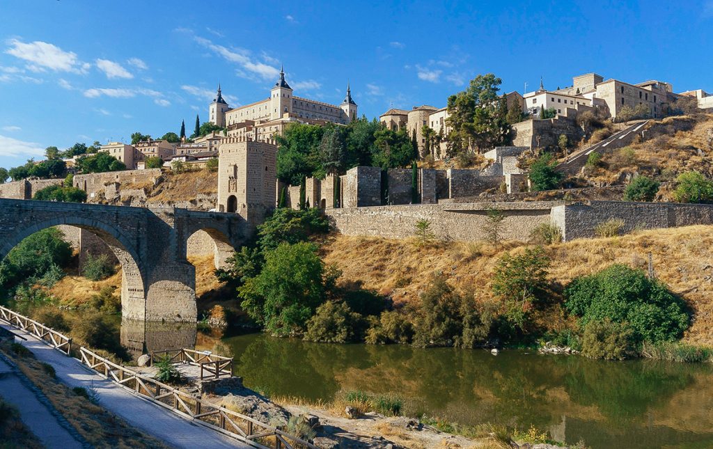 view of the ancient Puente de Alcántara in Toledo, Spain