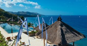 The amankila luxury hotel in East bali with its magnificient infinity pool all dressed up for a big celebration