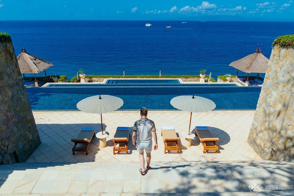 Walking down the stairs to the infinity pool of the Amankila luxury hotel in East Bali