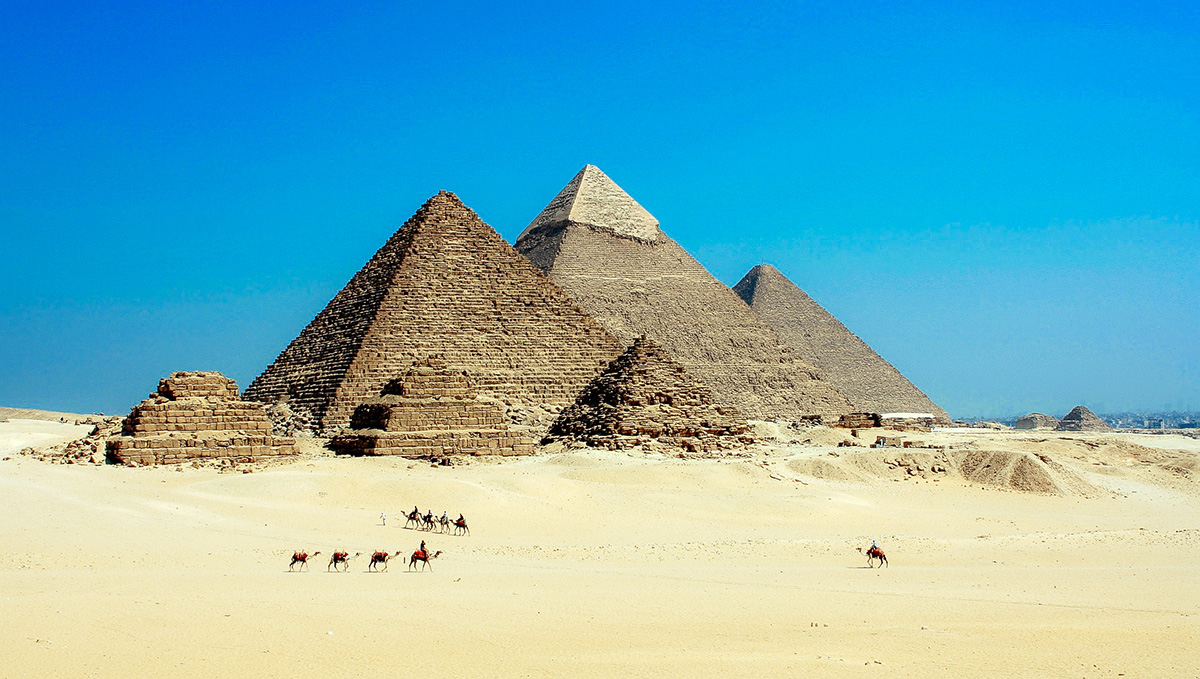 Classic postcard view of the Great Pyramids of Giza