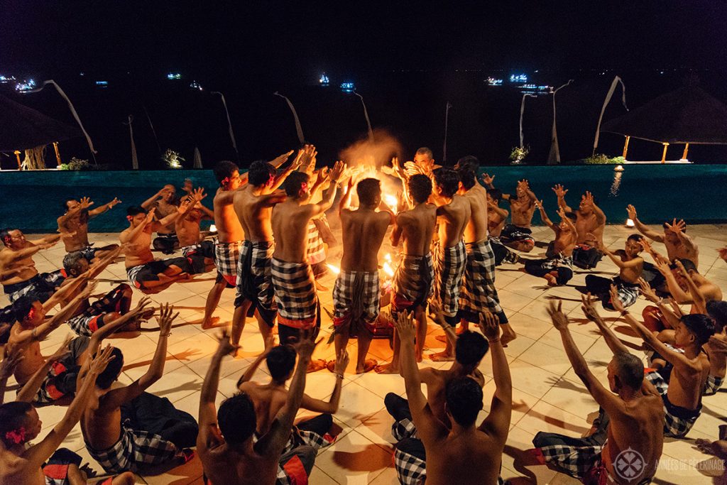 traditional Kecak dance performance at the infinity pool of the Amankila luxury resort