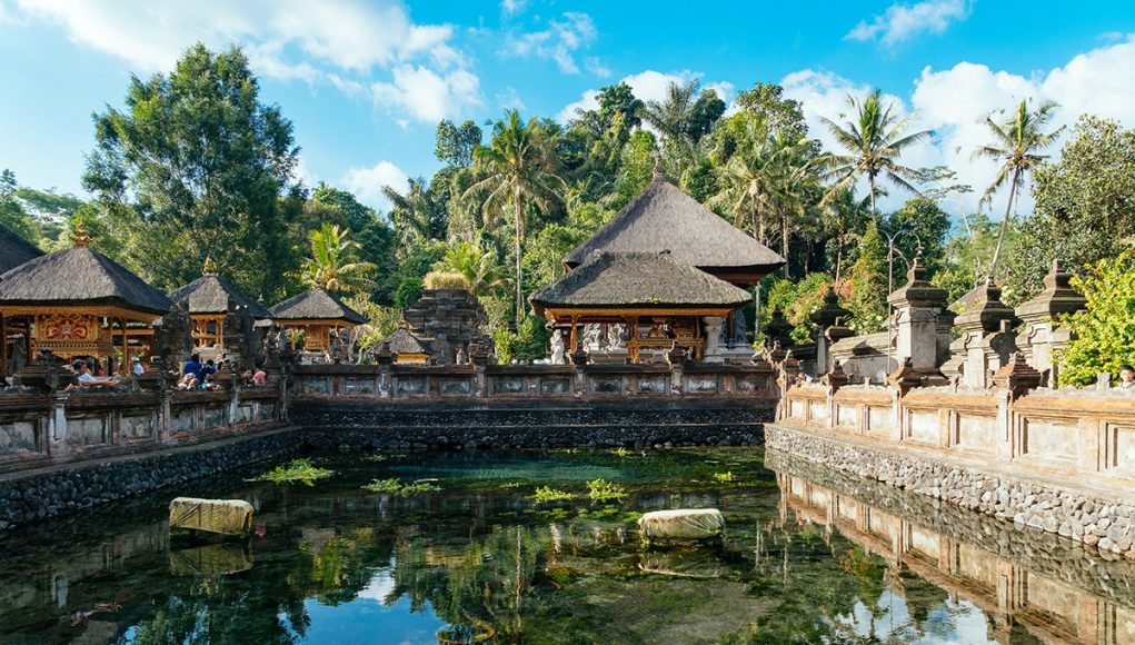 The main pond of the Tirta Empul water temple where arre spring is said to have its source. It's one of the biggest and most important Hindu temples and one of the things to do in Bali, Indonesia