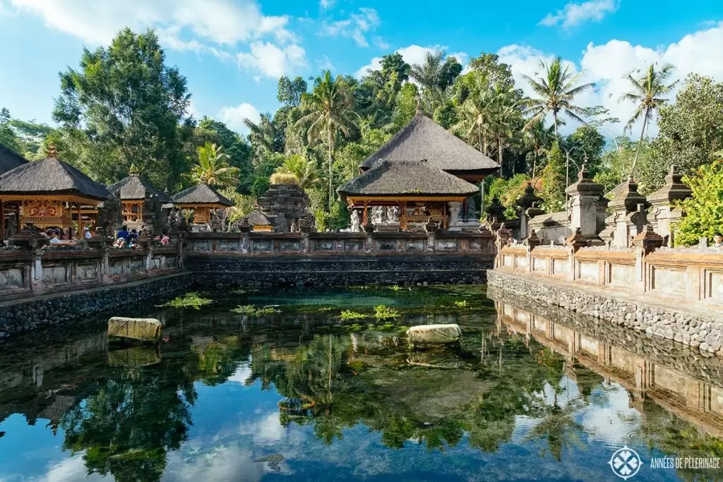 The main pond of the Tirta Empul water temple where arre spring is said to have its source. It's one of the biggest and most important Hindu temples and one of the things to do in Bali, Indonesia