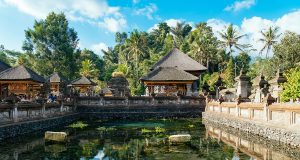 The main pond of the Tirta Empul water temple where arre spring is said to have its source. It's one of the biggest and most important Hindu temples and one of the things to do in Bali, Indonesia