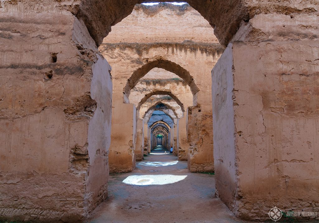 View along the endless corridors of the royal stables of Meknes, Morocco