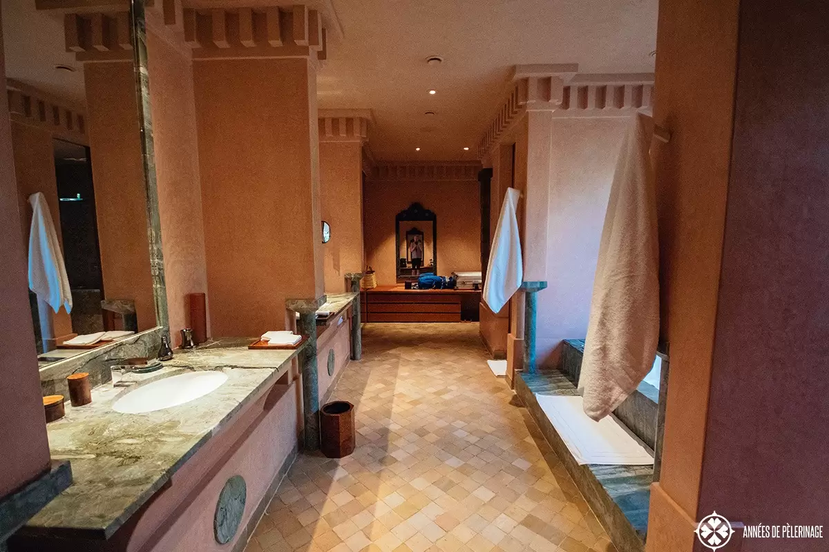 View along the gigantic bathroom at the amanjena luxury hotel in Marrakech, Morocco