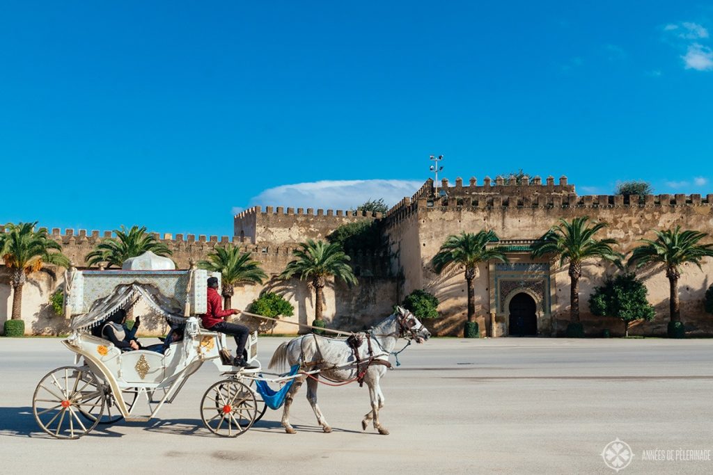 A fairy tale horse carriage in front of the royal palace of Meknes, Morocco