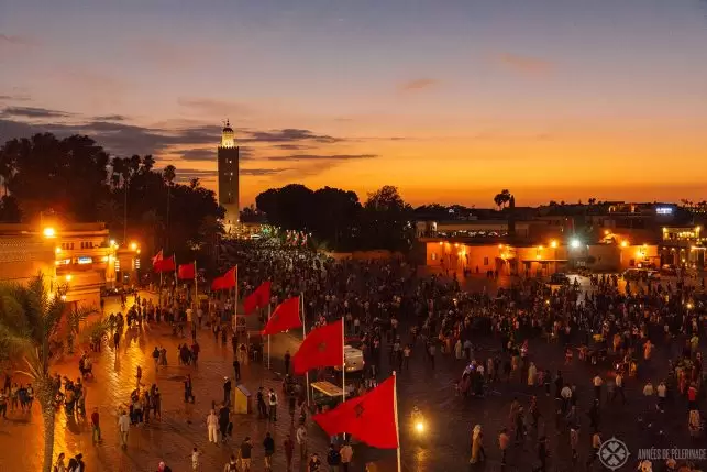 Jemaa El-Fnaa with the Koutoupia Mosque in the background in Marrekesh Morocco