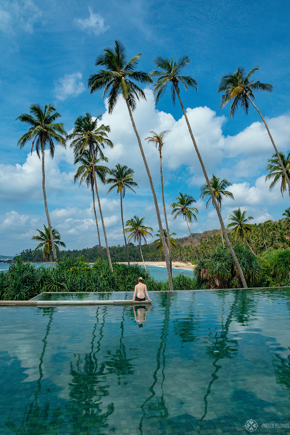 Me enjoying the view of the beach from the mainpool at Amanwella luxury resort