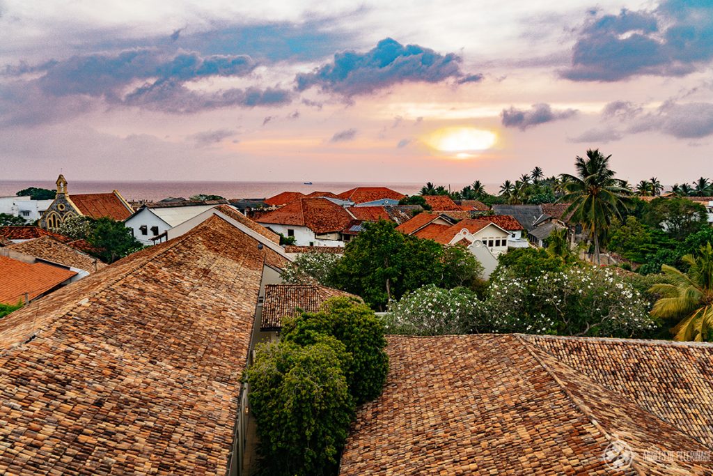 Sunset above the roofs of Galle as seen from the amangalla luxury hotel