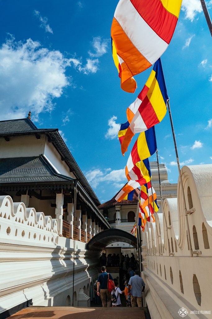 Buddhist banners above the Temple of the Tooth in Kandy, Sri Lanka